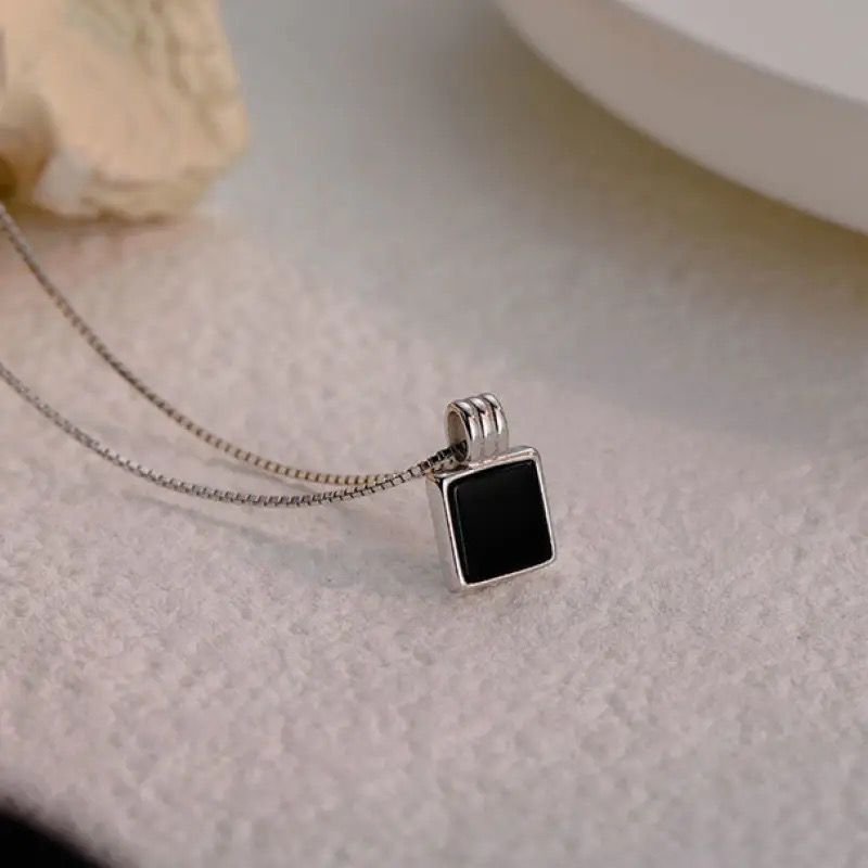 Chic retro square pendant necklace crafted from titanium steel with a black zircon accent.